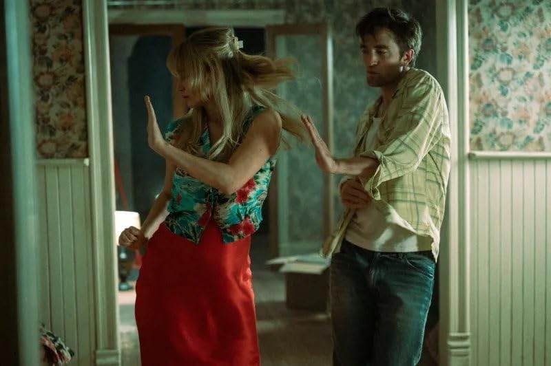 Robert Pattinson and Jennifer Lawrence in Die My Love (2025)